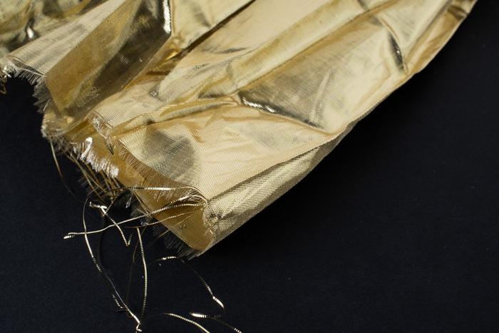 Tissu lamé scintillant doré