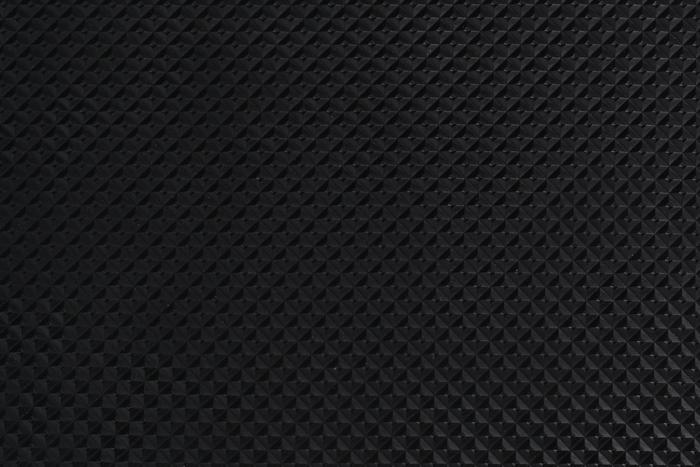 Tissu plastique avec motif en relief effet cuir artificiel