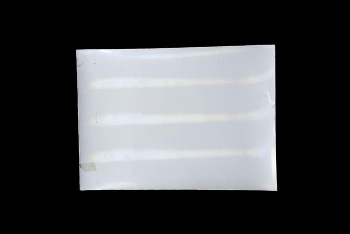 Tissu avec revêtement plastique blanc brillant holographique 